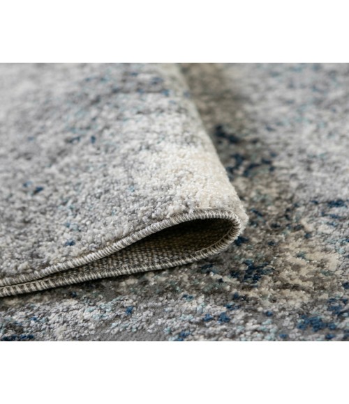 Yasmin Acy Light Blue Abstract Polyester Area Rug
