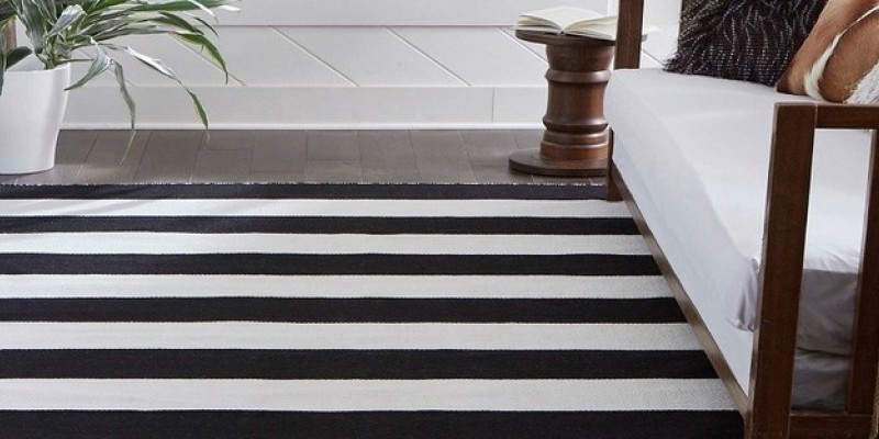 Decor with rugs to define a space Decor with rugs to define a space