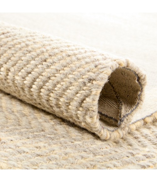 Kate Lester + Jaipur Living Esdras Handmade Solid Beige/ Ivory Area Rug 9'X12'