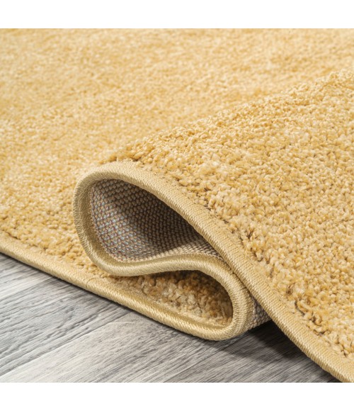 SUPERSOFT Area Rug Haze Solid Low-Pile Mustard 5 ft. x 8 ft. Oval Area Rug