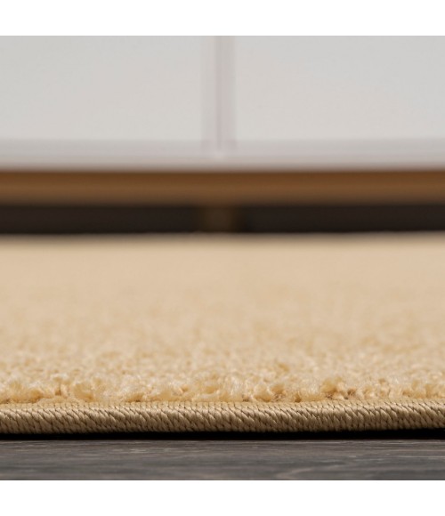 SUPERSOFT Area Rug Haze Solid Low-Pile Mustard 5 ft. x 8 ft. Oval Area Rug