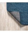SUPERSOFT Area Rug Haze Solid Low-Pile Navy 6 ft. x 9 ft. Oval Area Rug