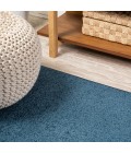 SUPERSOFT Area Rug Haze Solid Low-Pile Navy 6 ft. x 9 ft. Oval Area Rug