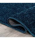 SUPERSOFT Area Rug Haze Solid Low-Pile Navy 6 ft. x 9 ft. Oval Area Rug
