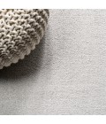 Haze Solid Low-Pile Ivory 3 ft. x 5 ft. Oval Area Rug