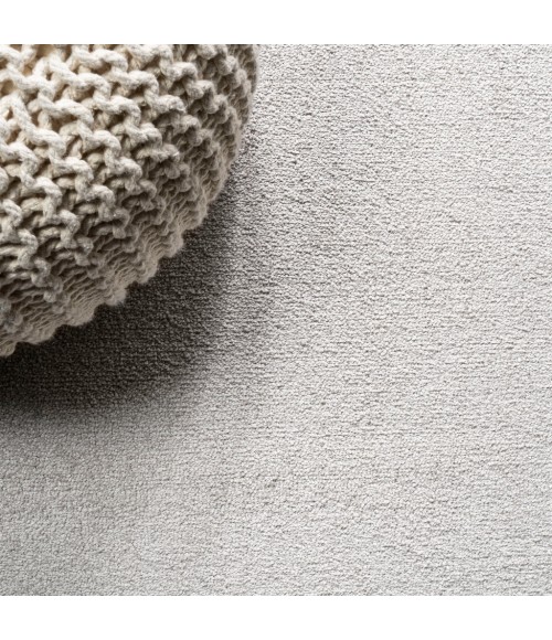 Haze Solid Low-Pile Ivory 3 ft. x 5 ft. Oval Area Rug