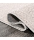 Haze Solid Low-Pile Ivory 3 ft. x 5 ft. Oval Area Rug