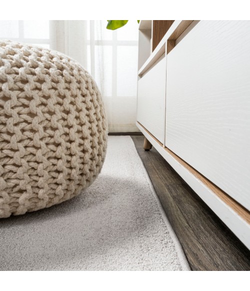 Haze Solid Low-Pile Ivory 3 ft. x 5 ft. Oval Area Rug