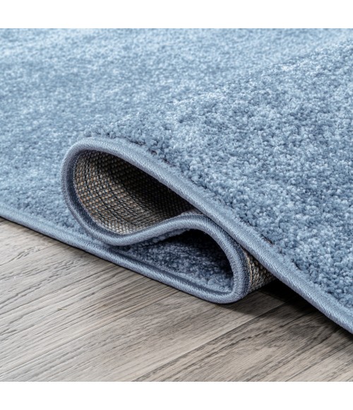 Haze Solid Low-Pile Classic Blue 5 ft. x 8 ft. Oval Area Rug