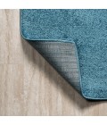 SUPERSOFT Area Rug Haze Solid Low-Pile Turquoise 5 ft. x 8 ft. Oval Area Rug