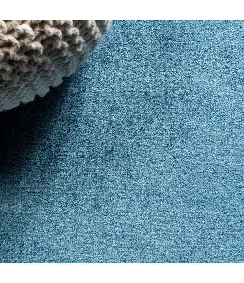 SUPERSOFT Area Rug Haze Solid Low-Pile Turquoise 5 ft. x 8 ft. Oval Area Rug