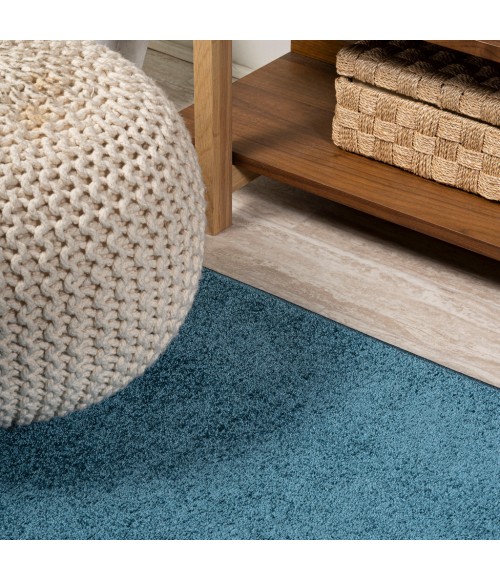SUPERSOFT Area Rug Haze Solid Low-Pile Turquoise 5 ft. x 8 ft. Oval Area Rug