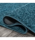 SUPERSOFT Area Rug Haze Solid Low-Pile Turquoise 5 ft. x 8 ft. Oval Area Rug