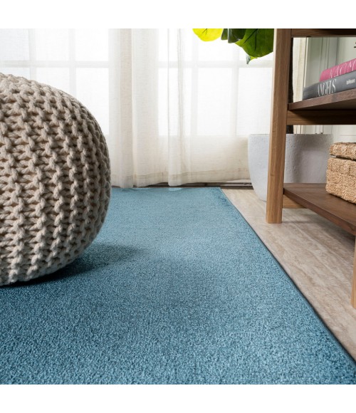 SUPERSOFT Area Rug Haze Solid Low-Pile Turquoise 5 ft. x 8 ft. Oval Area Rug