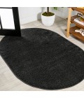 SUPERSOFT Area Rug Haze Solid Low-Pile Black 3 ft. x 5 ft. Oval Area Rug
