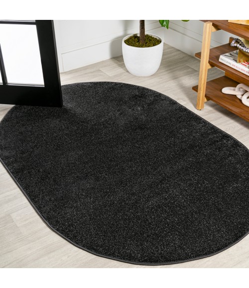 SUPERSOFT Area Rug Haze Solid Low-Pile Black 3 ft. x 5 ft. Oval Area Rug