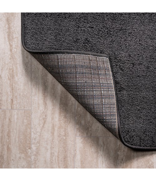 SUPERSOFT Area Rug Haze Solid Low-Pile Black 3 ft. x 5 ft. Oval Area Rug
