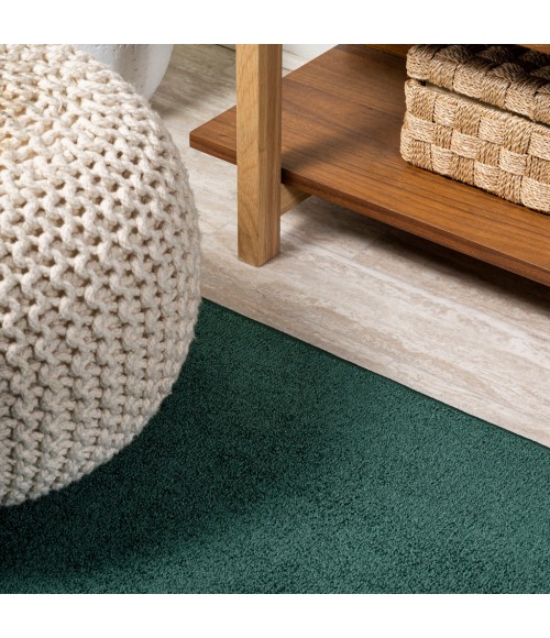 Haze Solid Low-Pile Emerald 5 ft. x 8 ft. Oval Area Rug