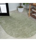 SUPERSOFT Area Rug Haze Solid Low-Pile Green 6 ft. x 9 ft. Oval Area Rug