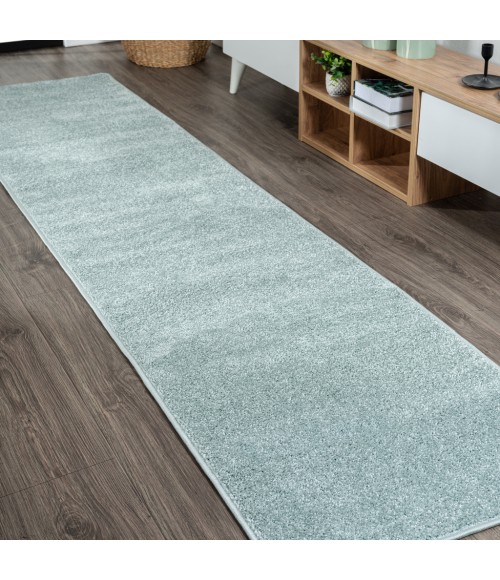 SUPERSOFT Area Rug Haze Solid Low-Pile Light Blue 2 ft. x 8 ft. Runner Rug