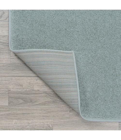 SUPERSOFT Area Rug Haze Solid Low-Pile Light Blue 2 ft. x 8 ft. Runner Rug