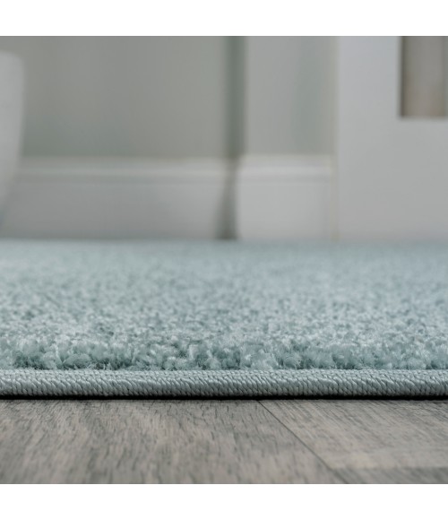 SUPERSOFT Area Rug Haze Solid Low-Pile Light Blue 2 ft. x 8 ft. Runner Rug