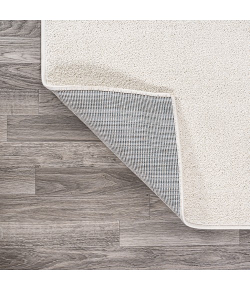 SUPERSOFT Area Rug Haze Solid Low-Pile Cream 4 ft. x 6 ft. Oval Area Rug