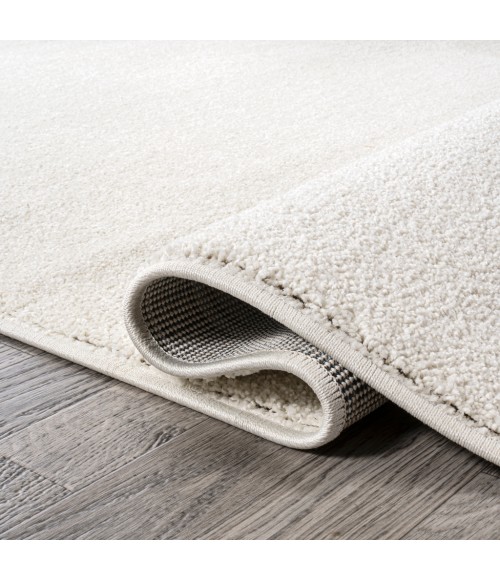 SUPERSOFT Area Rug Haze Solid Low-Pile Cream 4 ft. x 6 ft. Oval Area Rug