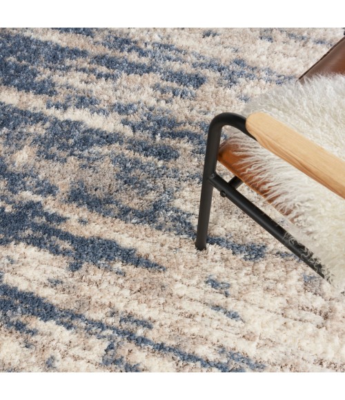 Nourison Luxurious Shag Light Blue Grey LXR10 6 ft. 7 in. X 9 ft. 2 in. Rect. Rug