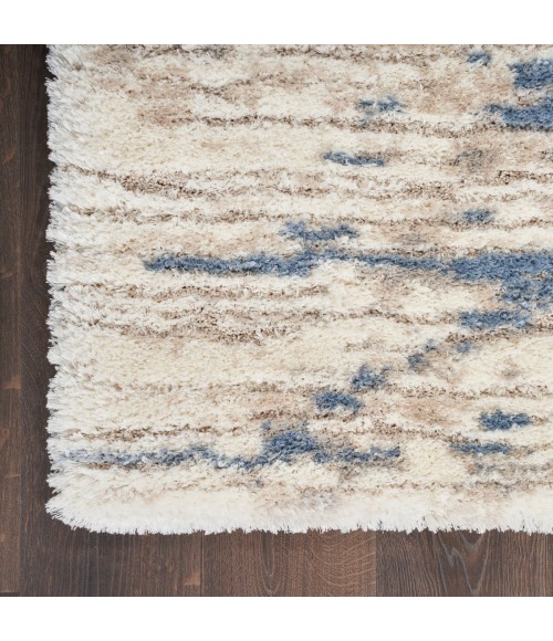 Nourison Luxurious Shag Light Blue Grey LXR10 6 ft. 7 in. X 9 ft. 2 in. Rect. Rug
