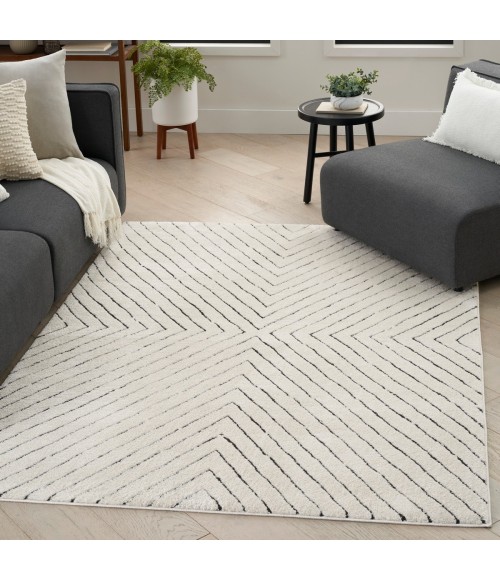 Nourison Cozy Modern Ivory Black Rug CMD01 6 ft. 7 in. X 9 ft. Rect. - Rugs Town Nourison Cozy Modern Ivory Black CMD01 6 ft. 7 in. X 9 ft. Rect. Rug