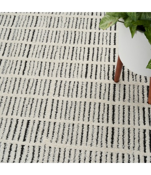 Nourison Cozy Modern Ivory Black CMD03 6 ft. 7 in. X 9 ft. Rect. Rug