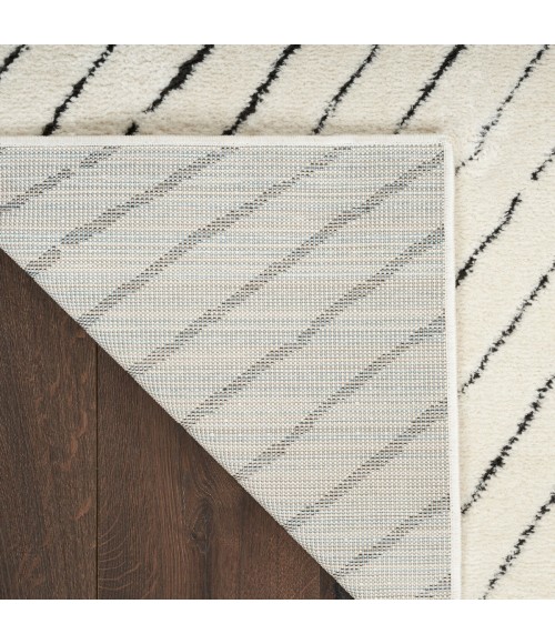 Nourison Cozy Modern Ivory Black Rug CMD01 5 ft. 3 in. X 7 ft. Rect. - Rugs Town Nourison Cozy Modern Ivory Black CMD01 5 ft. 3 in. X 7 ft. Rect. Rug