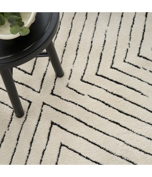 Nourison Cozy Modern Ivory Black Rug CMD01 5 ft. 3 in. X 7 ft. Rect. - Rugs Town Nourison Cozy Modern Ivory Black CMD01 5 ft. 3 in. X 7 ft. Rect. Rug