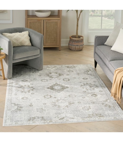 Nourison Astra Machine Washable Ivory ASW19 6 ft. 7 in. X 9 ft. Rect. Rug