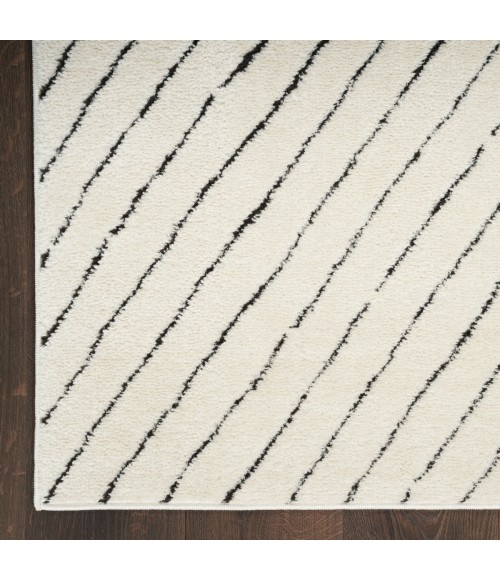 Nourison Cozy Modern Ivory Black Rug CMD01 5 ft. 3 in. X 7 ft. Rect. - Rugs Town Nourison Cozy Modern Ivory Black CMD01 5 ft. 3 in. X 7 ft. Rect. Rug
