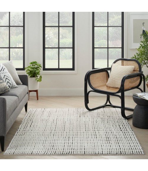 Nourison Cozy Modern Ivory Black CMD03 6 ft. 7 in. X 9 ft. Rect. Rug