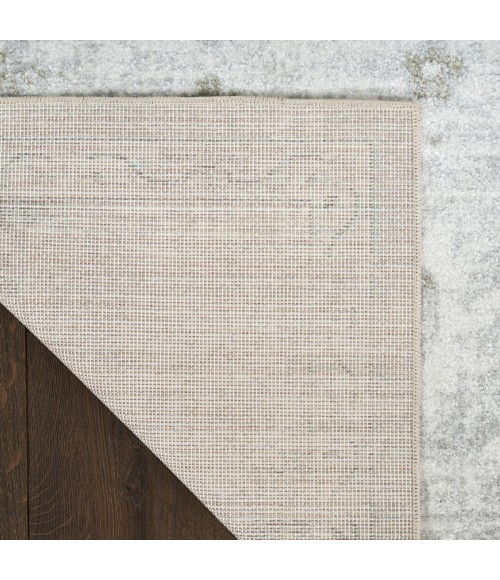 Nourison Astra Machine Washable Ivory ASW19 6 ft. 7 in. X 9 ft. Rect. Rug