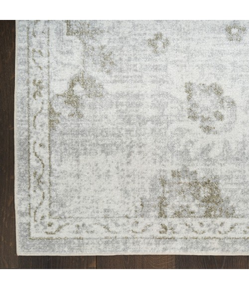 Nourison Astra Machine Washable Ivory ASW19 6 ft. 7 in. X 9 ft. Rect. Rug