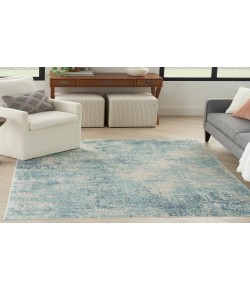 Nourison Astra Machine Washable Blue Ivory ASW07 5 ft. 3 in. X 7 ft. Rectangle Rug