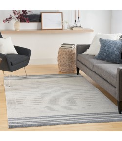 Nourison Home Astra Machine Washable ASW04 Ivory Blue 6 ft. 7 in. X 9 ft. Area Rug