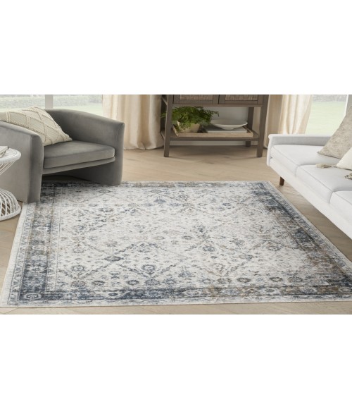 Nourison Astra Machine Washable Ivory Blue ASW16 5 ft. 3 in. X 7 ft. Rectangle Rug