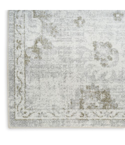 Nourison Astra Machine Washable Ivory ASW19 6 ft. 7 in. X 9 ft. Rect. Rug