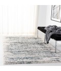 Safavieh Fontana Shag  Ivory / Teal FNT850 6 ft. 7 in. X 9 ft. Rectangle Rug