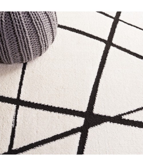 Safavieh Melody Ivory / Black Rug MEL120 8 ft. X 10 ft. Rectangle - Rugs Town Safavieh Melody Ivory / Black MEL120 8 ft. X 10 ft. Rectangle Rug