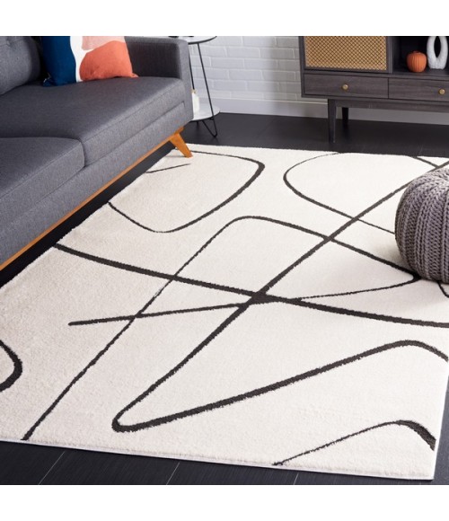 Safavieh Melody Ivory / Black Rug MEL120 8 ft. X 10 ft. Rectangle - Rugs Town Safavieh Melody Ivory / Black MEL120 8 ft. X 10 ft. Rectangle Rug