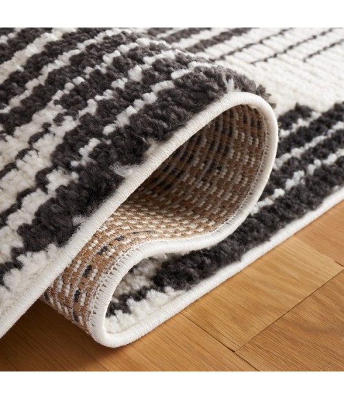 Safavieh Moroccan Tassel Ivory / Black Rug MRT101 6 ft. 7 in. X 6 ft. 7 in. Square - Rugs Town Safavieh Moroccan Tassel Ivory / Black MRT101 6 ft. 7 in. X 6 ft. 7 in. Square Rug