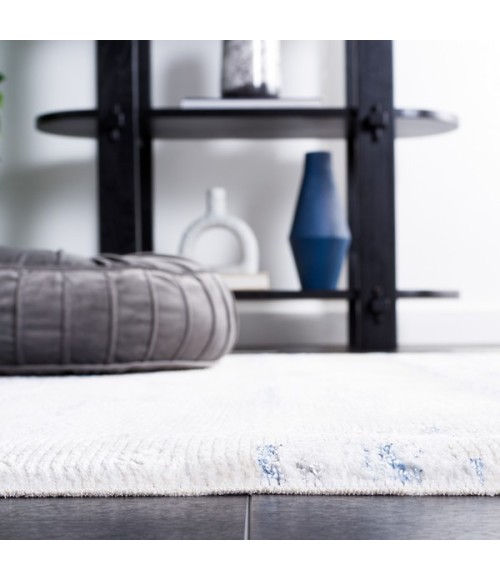 Safavieh Whisper Grey / Blue Ivory Rug WHS542 5 ft. 3 in. X 7 ft. 6 in. Rectangle - Rugs Town Safavieh Whisper Grey / Blue Ivory WHS542 5 ft. 3 in. X 7 ft. 6 in. Rectangle Rug