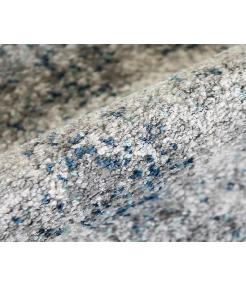 Yasmin Acy Light Blue Abstract Polyester Area Rug