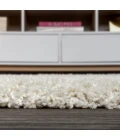 Mercer Shag Plush Tassel Cream 2 ft. x 8 ft. Runner Rug